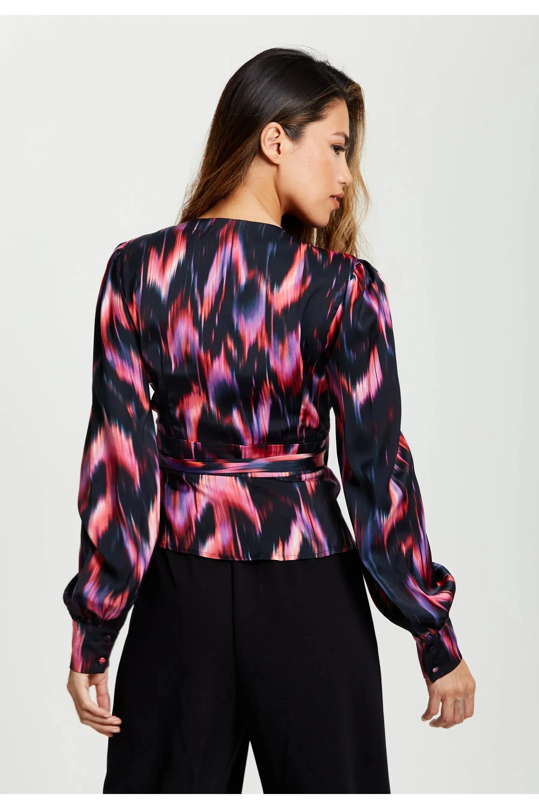 Liquorish Abstract Feather Print Wrap Top In Black And Print